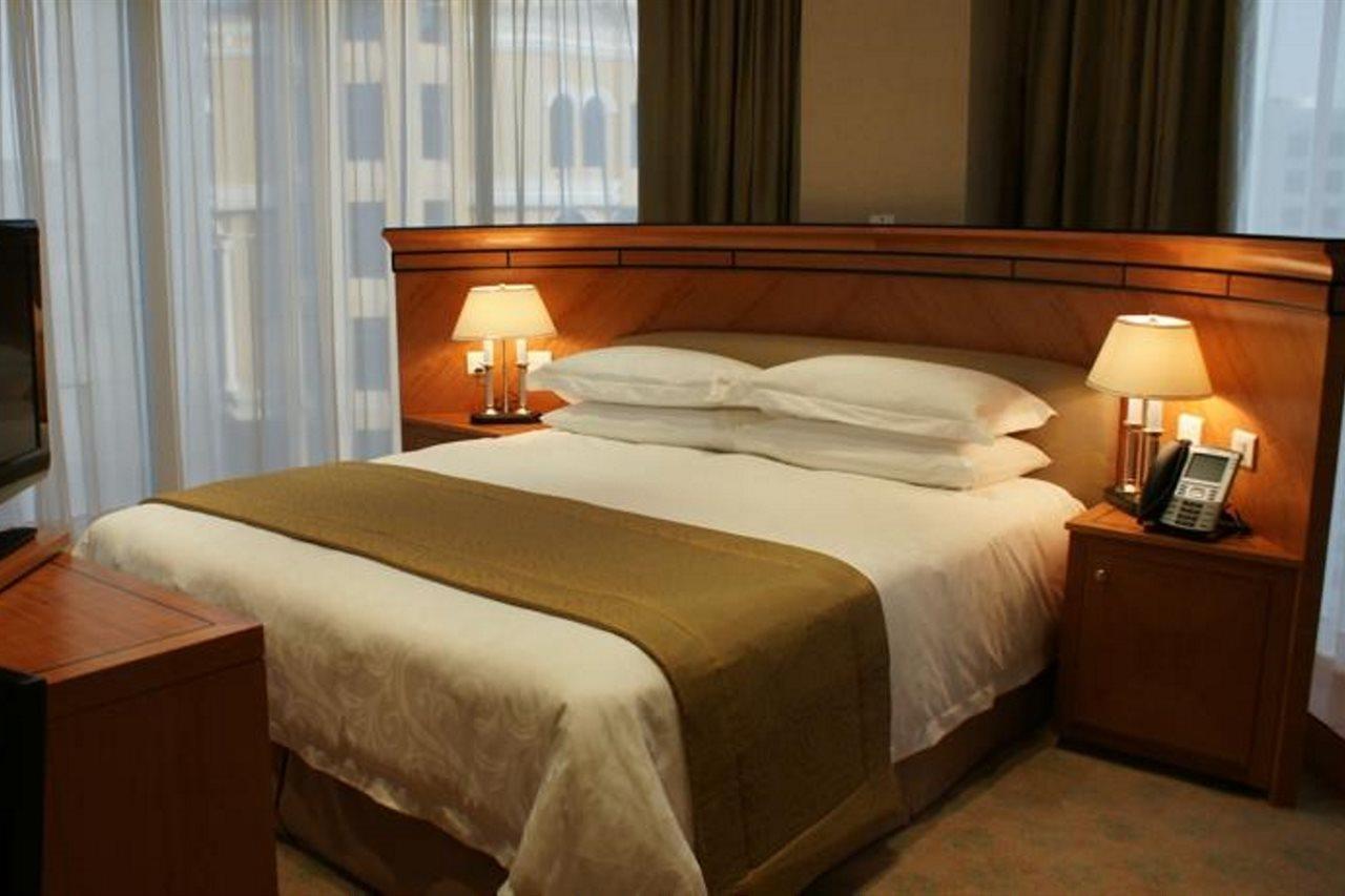 Wiseman Grand Hotel Doha Eksteriør billede A bed